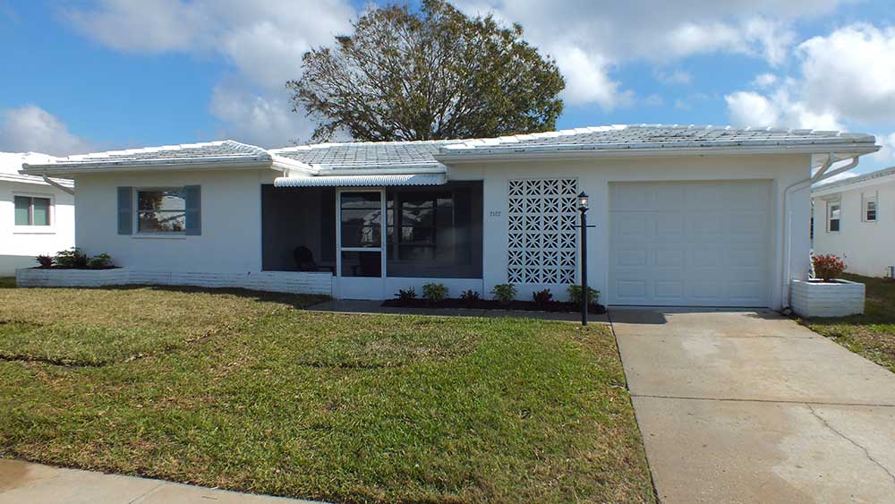 3522 100th Ter N Outside Home Renovation — After
