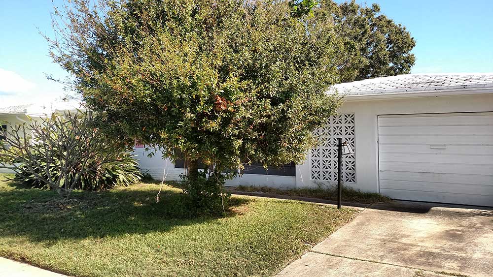 3522 100th Ter N Outside Home Renovation — Before
